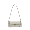 Minimalist ivory baguette shoulder bag featuring retro gold clasp and sleek long strap - White