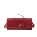 Elegant dark red ostrich textured handbag with golden metal clasp and top handle - Red