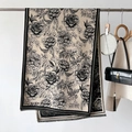 Detail of beige cashmere scarf with black peony floral patterns and fine fringe - Black