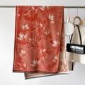 Elegant orange shawl with white maple leaf pattern and grey tassels for winter warmth - Orange