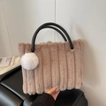 Striped plush tote bag in khaki faux fur with black woven handles and white pompom charm - Coffee (With Charm)