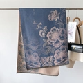 Detail shot of vintage floral pattern and short fringe on double-sided winter scarf - 66*186cm / Blue