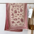Detail of vintage paisley shawl with nautical illustrations hanging in lifestyle setting - Red (GSJ-358)