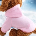 Pink sporty hooded dog sweatshirt with white sleeve stripes on a brown poodle - Pink