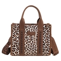 Leopard print tote bag with dark brown textured trim and adjustable shoulder strap - White