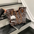 Brown graffiti tote bag with cloud plush charm and artistic white cartoon prints - With Charm / Brown