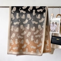 Detail of gradient knitted cat scarf with woven feline patterns and soft fringe trim - Khaki Grey