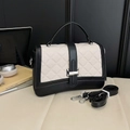 Quilted black and white crossbody bag with silver clasp and top handle for women - White & Black