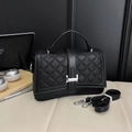 Elegant black quilted shoulder bag with silver clasp and detachable strap - Black