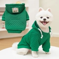 Detail of green quilted pet hoodie with bear badge and pocket on back for dogs - S / Dark Green