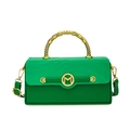 Chic green box bag with wave patterns and golden spiral handle in a variant view - Green