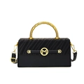 Black box crossbody bag with gold spiral handle and M-letter metal buckle closure - Black