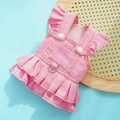 Detailed view of pink denim pet dress featuring metal D-ring and ruffle shoulder straps - Jelly Pink Pocket Denim Skirt
