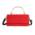 Quilted red suede crossbody bag with elegant gold metal handle and black strap - Red