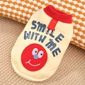 Detail of warm beige knitted pet harness vest with red Smile With Me print and D-ring - XS / Apricot Smile
