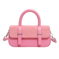 Pink wave-textured leather handbag with stylish dual-tone handle and vertical straps - Pink