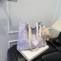 Lavender tote bag with purple bow patterns and plush charm for daily commuting - With Charm / Purple
