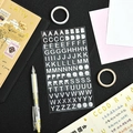 Silberne Glitzer-Alphabet-Aufkleber für Planer auf schwarzem Grund mit Schreibwaren - Silberne Standardbuchstaben