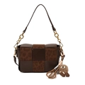 Vintage dark brown woven leather crossbody bag with leopard print and plush charm accessory - Brown