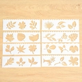Set of 8 white plastic journaling stencils with varied plant and leaf cutouts for drawing - Leaf Design