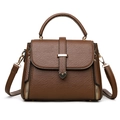Bolso de mano marrón de gran capacidad con asa superior y detalles metálicos dorados - Marrón