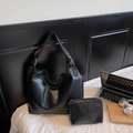 Black leather hobo bag set with stylish knot detail and matching zipper pouch - Black