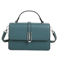 Chic teal square handbag with top handle and silver metal buckle in matte finish - Green