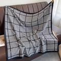Close-up of black and white houndstooth silk scarf draped on a leather background - Black Houndstooth (XW-35-Black)