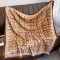 Macro shot of twill silk scarf with woven texture pattern and lucky lettering detail - 90*90cm / Khaki