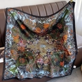 Detail of 90cm silk scarf with vibrant tropical floral pattern and black border edges - Black Border (XW-45)