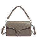Brown woven saddle bag featuring a silver metal C-buckle and adjustable shoulder strap - Brown