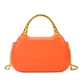 Vibrant orange textured leather box bag with a golden bamboo-style metal handle - Orange
