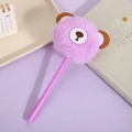 Cute purple plush bear pompom gel pen with soft faux fur on minimalist background - Purple