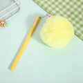 Cute yellow unicorn gel pen with a large fluffy pompom and metal charm hanging - Yellow