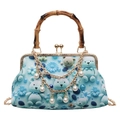 Blue teddy bear print kiss lock bag with bamboo handle and pearl chain strap - Blue