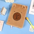 Cute brown plush bear notebook with 3D ears on a fresh blue background - Capybara Style