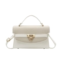 Elegante borsa Kelly bianco crema con inserti in tessuto intrecciato e chiusura dorata - Bianco