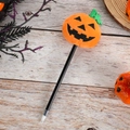 Detail of creative Halloween pumpkin plush pen on a festive wooden background texture - Black Pumpkin Smile
