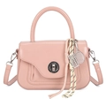 Pink PU leather crossbody bag with silver ring clasp and decorative cord charms - Pink