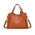 Caramel brown pebbled leather bucket bag with knotted handle and shoulder strap - Orange