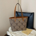 Brown monogram tote bag with gold kangaroo logo and spacious leather handles - OYE Khaki
