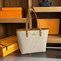 Beige and brown tote bag with letter print and kangaroo logo on display - JADF Beige
