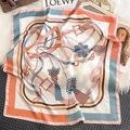 Detailed view of square silk scarf with elegant equestrian prints on plush background - 65*65cm / Rice Pink