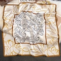 Detailed close-up of a vintage floral silk square scarf with satin finish on plush background - One Size / Beige