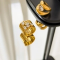 Detail shot of 18K gold plated multi-layer ring featuring five pear-cut zircon stones - Multi Teardrop Spiral
