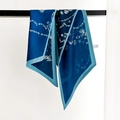 Elegant navy blue printed silk scarf with chain patterns hanging on a black metal bar - Blue (XY-19-Blue)