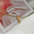 Artistic gold female sculpture pendant on delicate necklace over abstract painting - Gold (Single Layer)