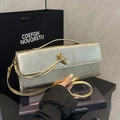 Golden snakeskin embossed clutch bag with luxury metallic knot buckle and rectangular silhouette - Champagne