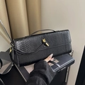 Sac à main noir gaufré serpent avec fermoir nœud doré et poignée élégante de luxe - Noir