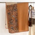 Detail of vintage paisley and geometric pattern silk scarf draped on a metal bar - Beige Brown (FSM-14)